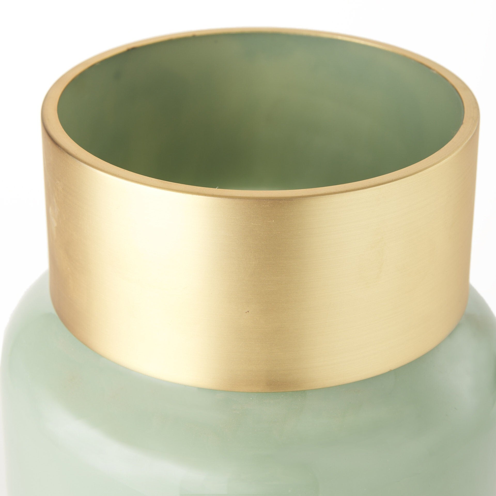 Mid-century modern smokey green glass vase with retro charm and contemporary design
