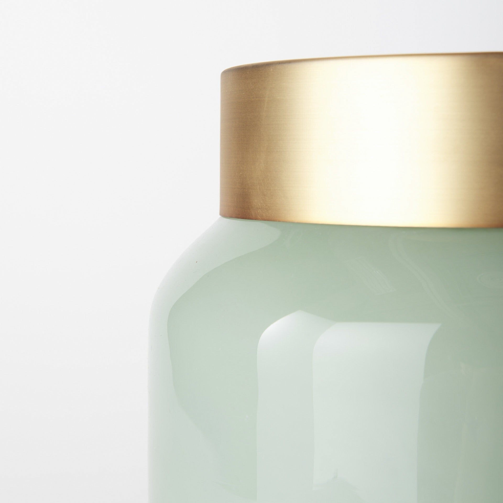 Smokey green glass vase with gold metal cuff - versatile decorative piece for living room, kitchen, or vanity table