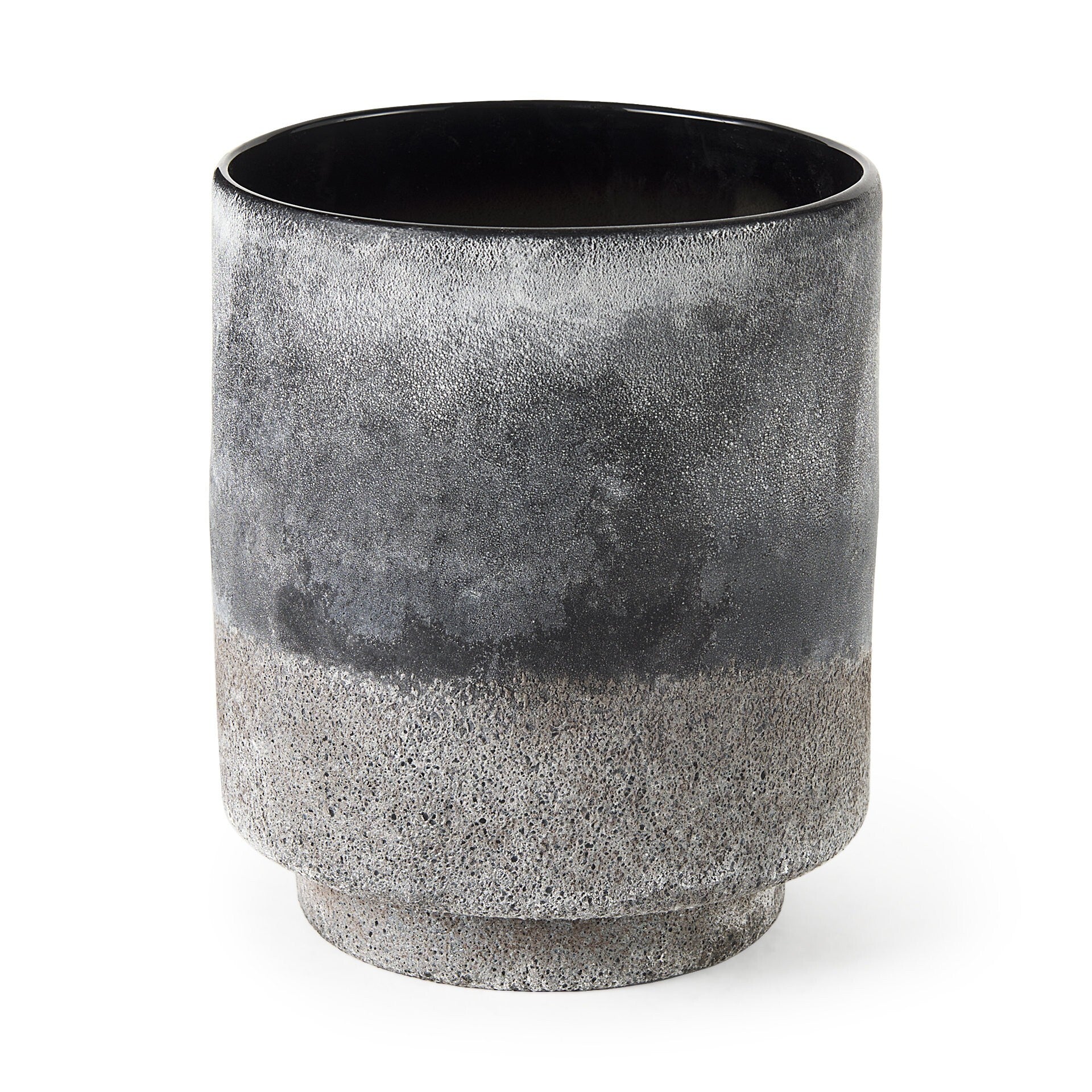 Close-up of ombre ceramic vase showing black and gray gradient effect with textured and distressed finish for industrial style
