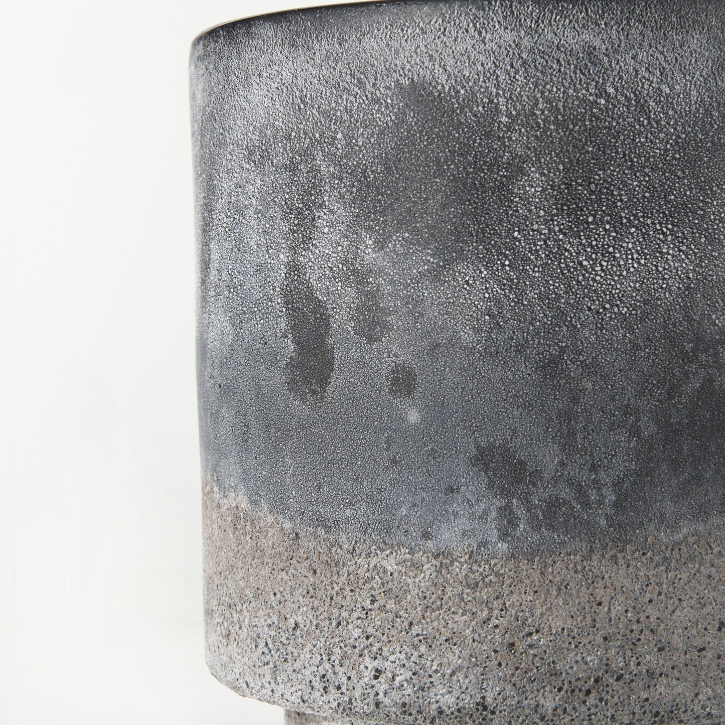 Industrial textured ceramic vase with black gray ombre showing distressed finish ideal for contemporary home accent pieces