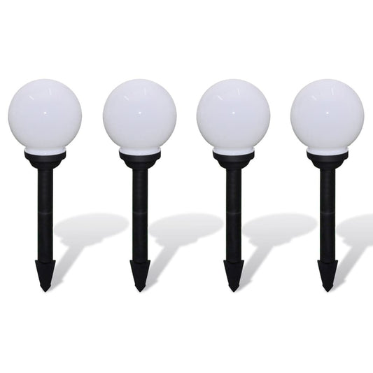 Close-up view of white solar garden lights showing UV-resistant plastic construction and modern spherical shape
