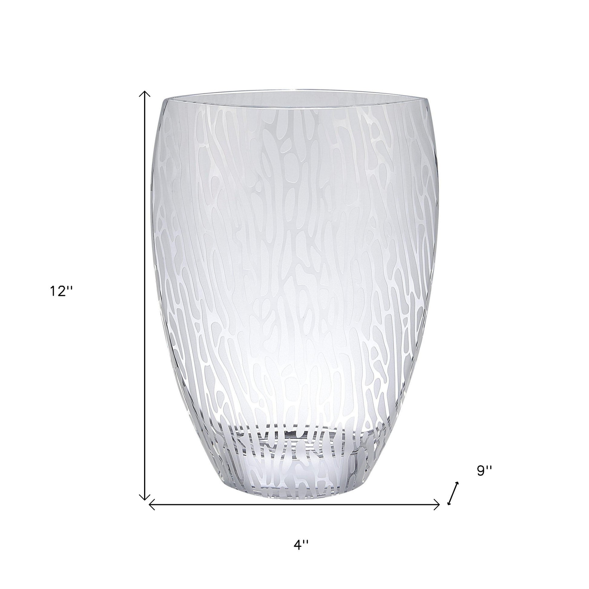 Abstract oval vase close-up detail of frosted and clear crystal glass, modern elegant table decor
