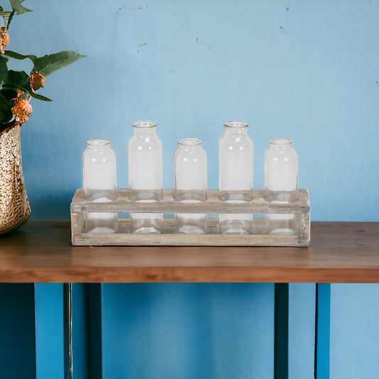 Set of 5 clear cylinder glass decorative bottles in varying heights, modern minimalist table decor

