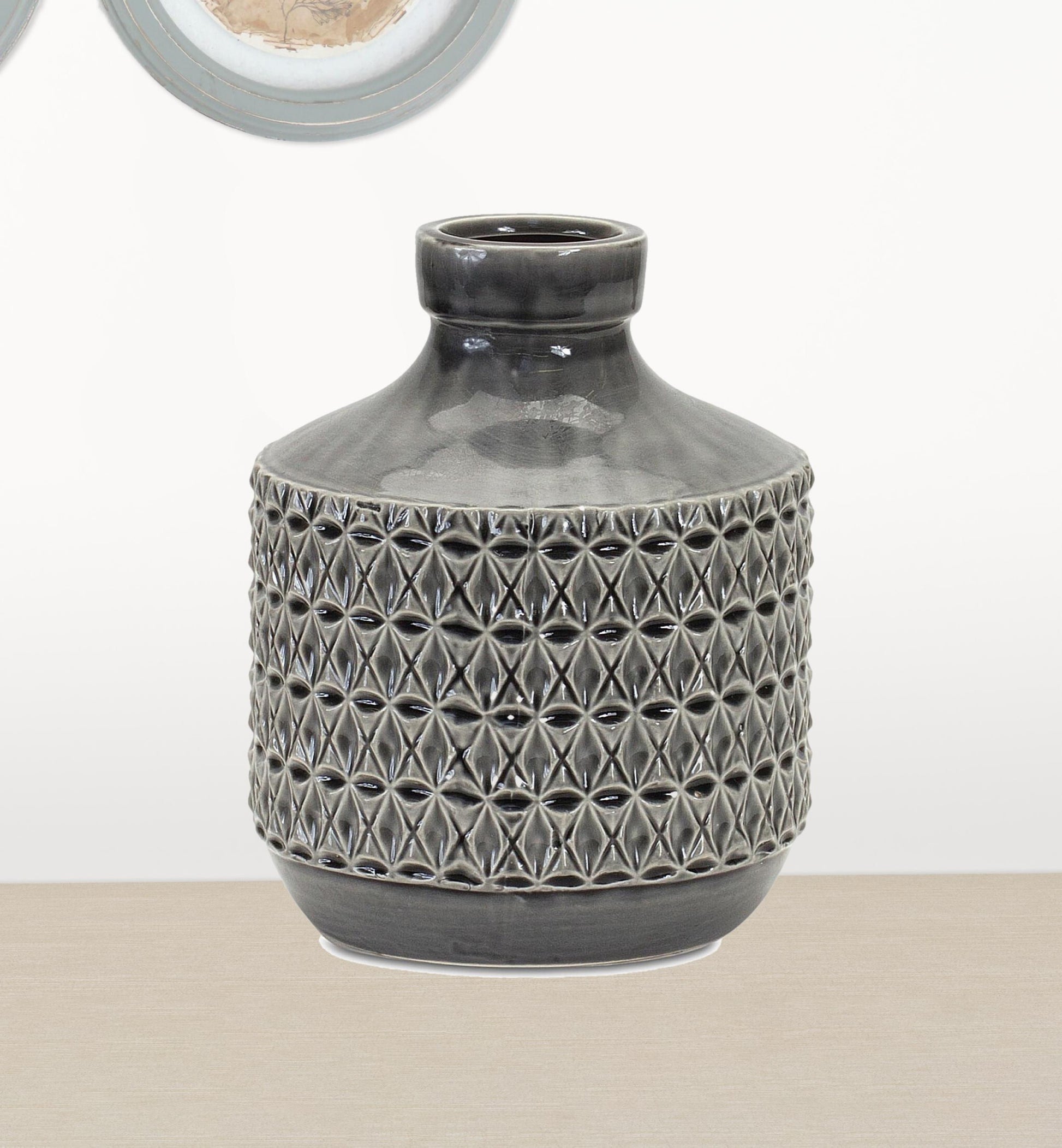 Modern minimalist gray vase showing geometric texture and matte finish, perfect for single stem flowers
