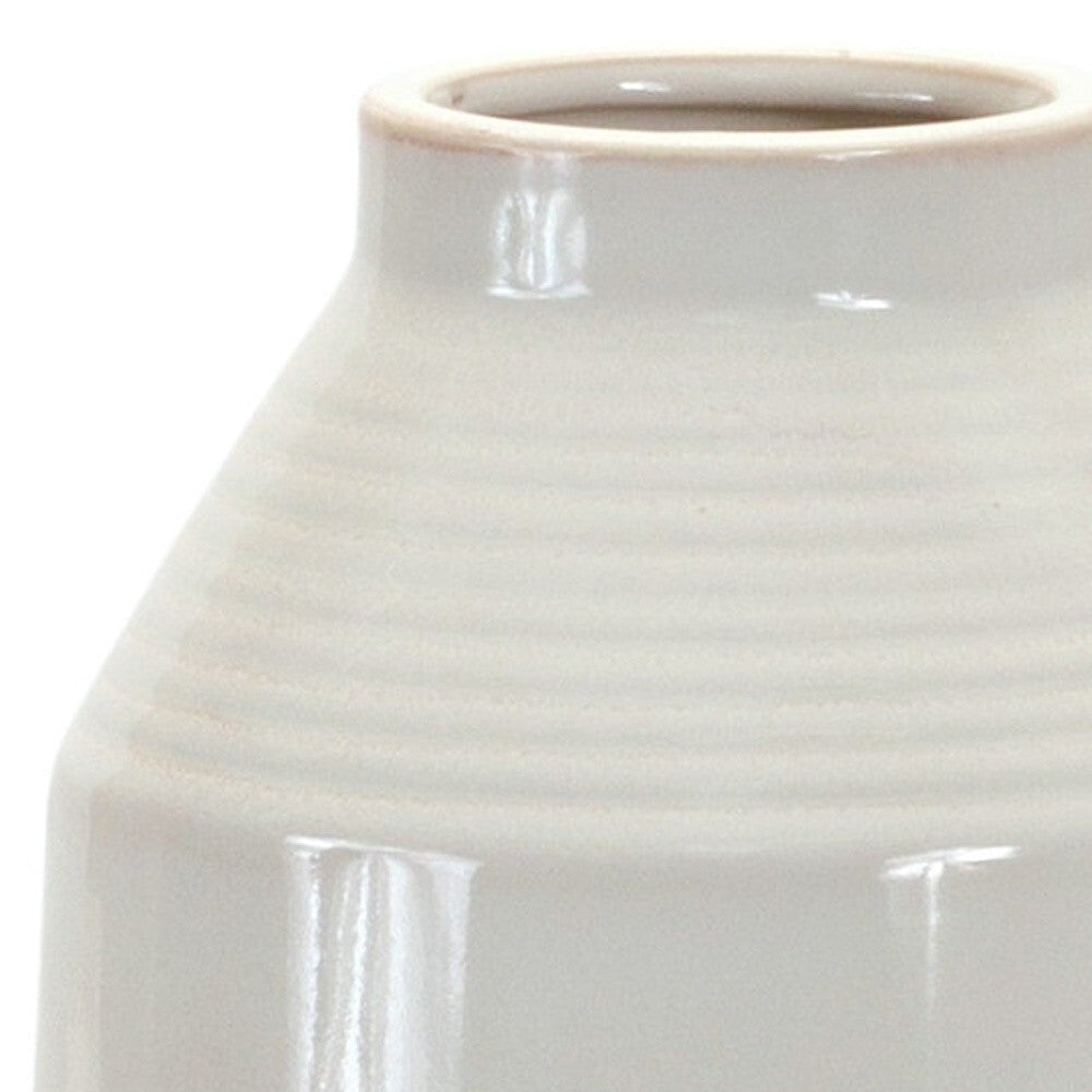 Contemporary white vase showing ribbed texture and elegant finish, 15 inch modern home accent
