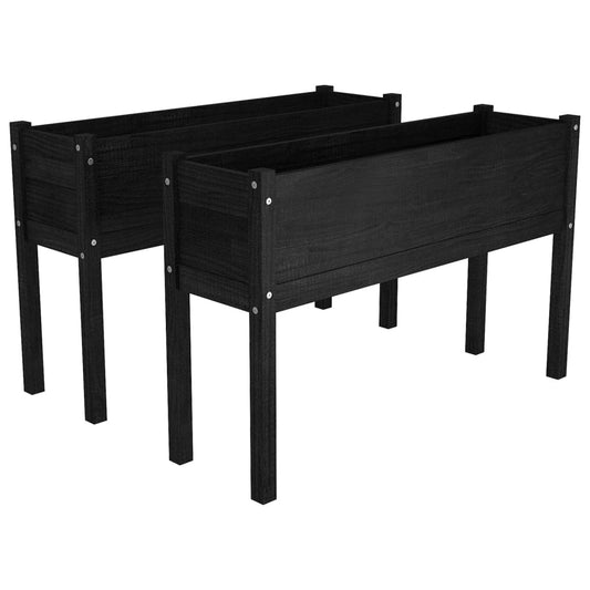 Close-up of matte black finish on solid pine wood planter